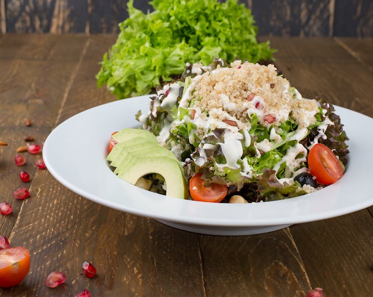 Vegetarian power bowl at Chuys with avocado and greens